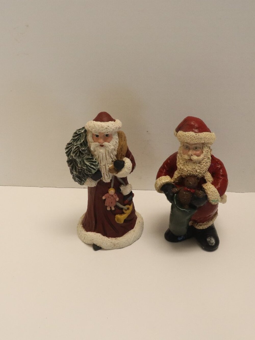 Lot of 2 Christmas Bisque Porcelain Santa Clauses
